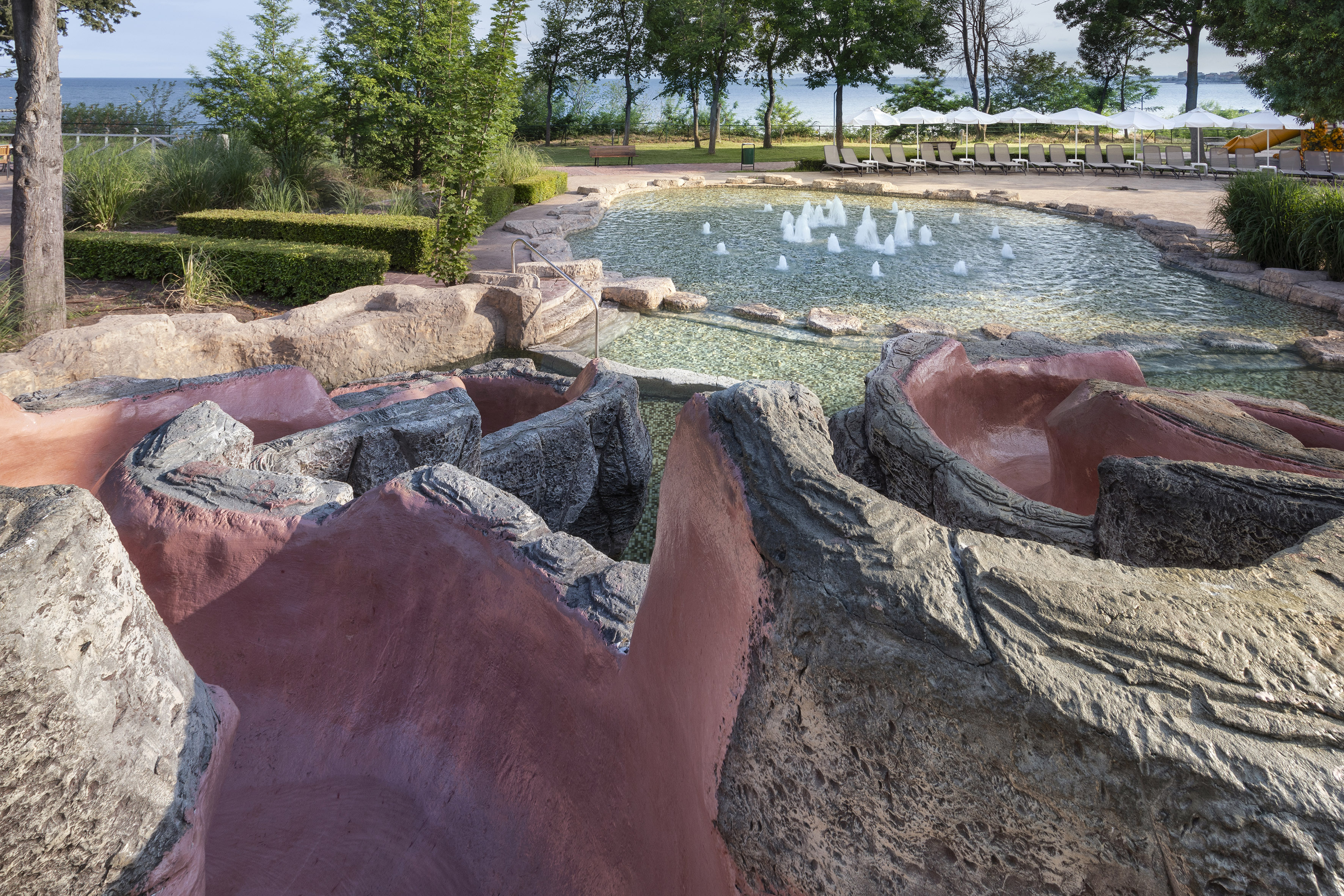 a pool with water and rocks