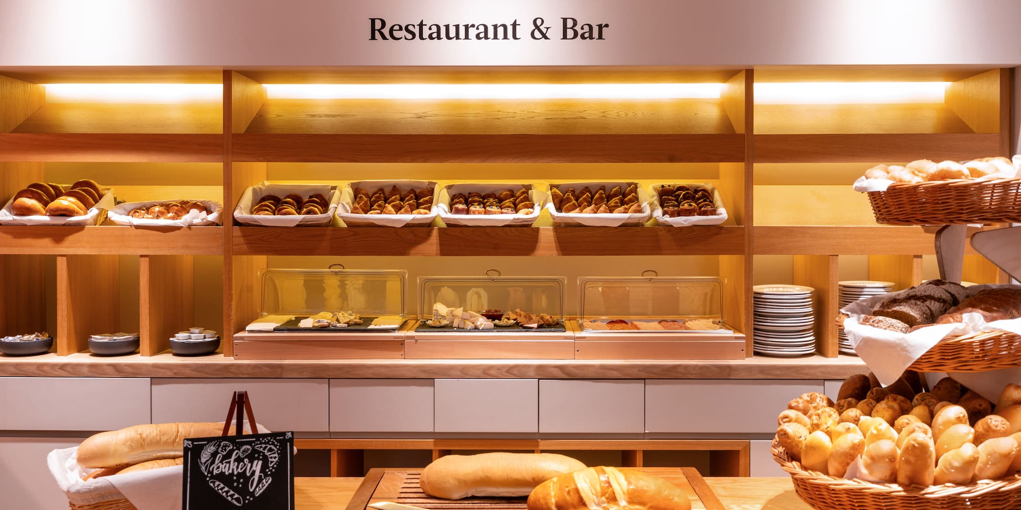 a bakery display with bread and pastries
