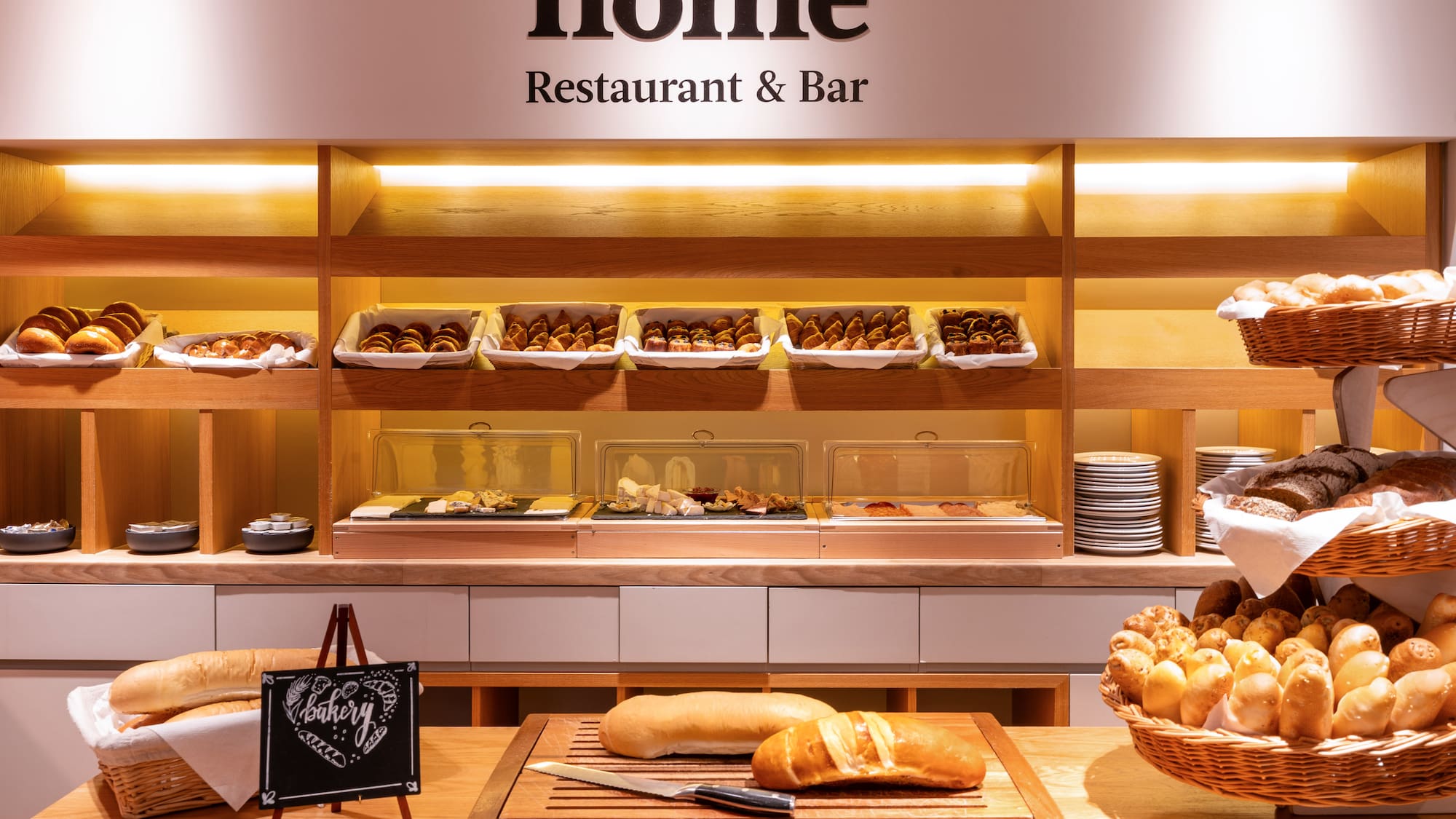 a bakery display with bread and pastries