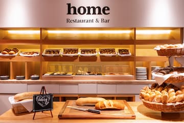 a bakery display with bread and pastries