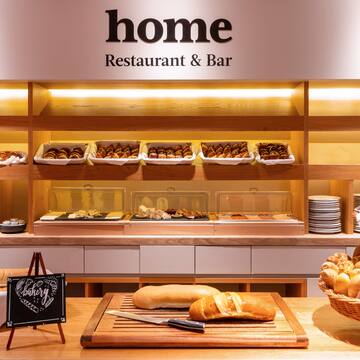 a bakery display with bread and pastries