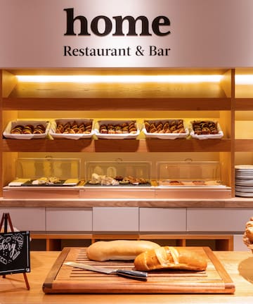 a bakery display with bread and pastries