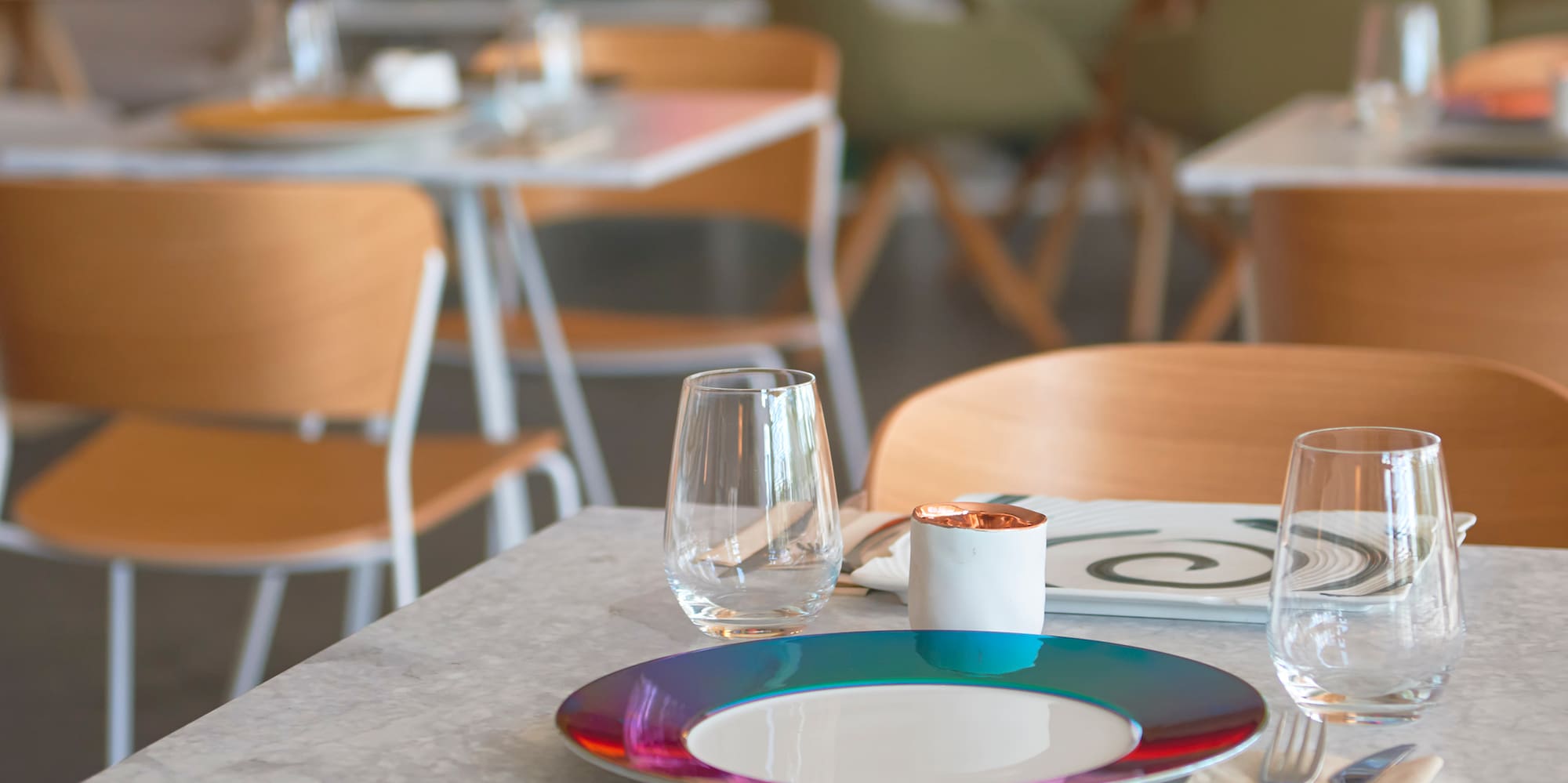 a table with plates and glasses on it