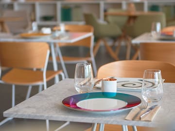 a table with plates and glasses on it