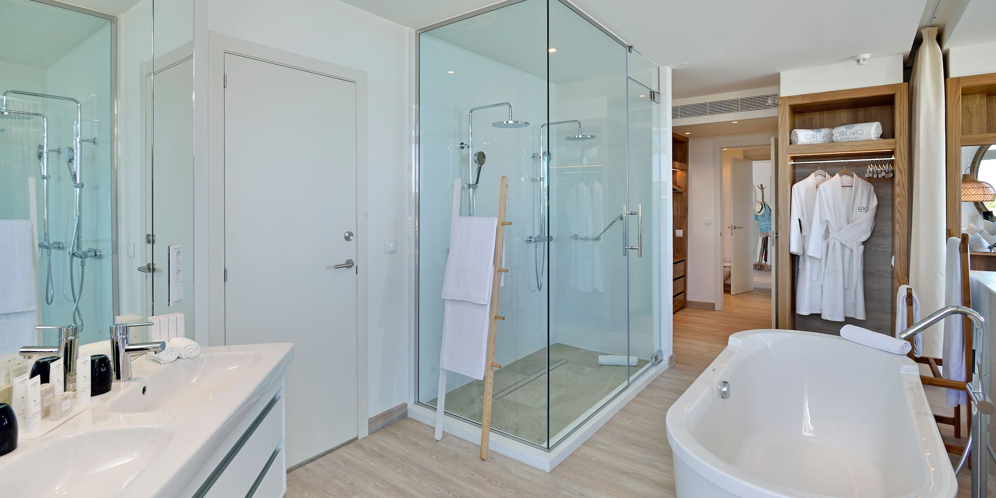 a bathroom with a tub and shower