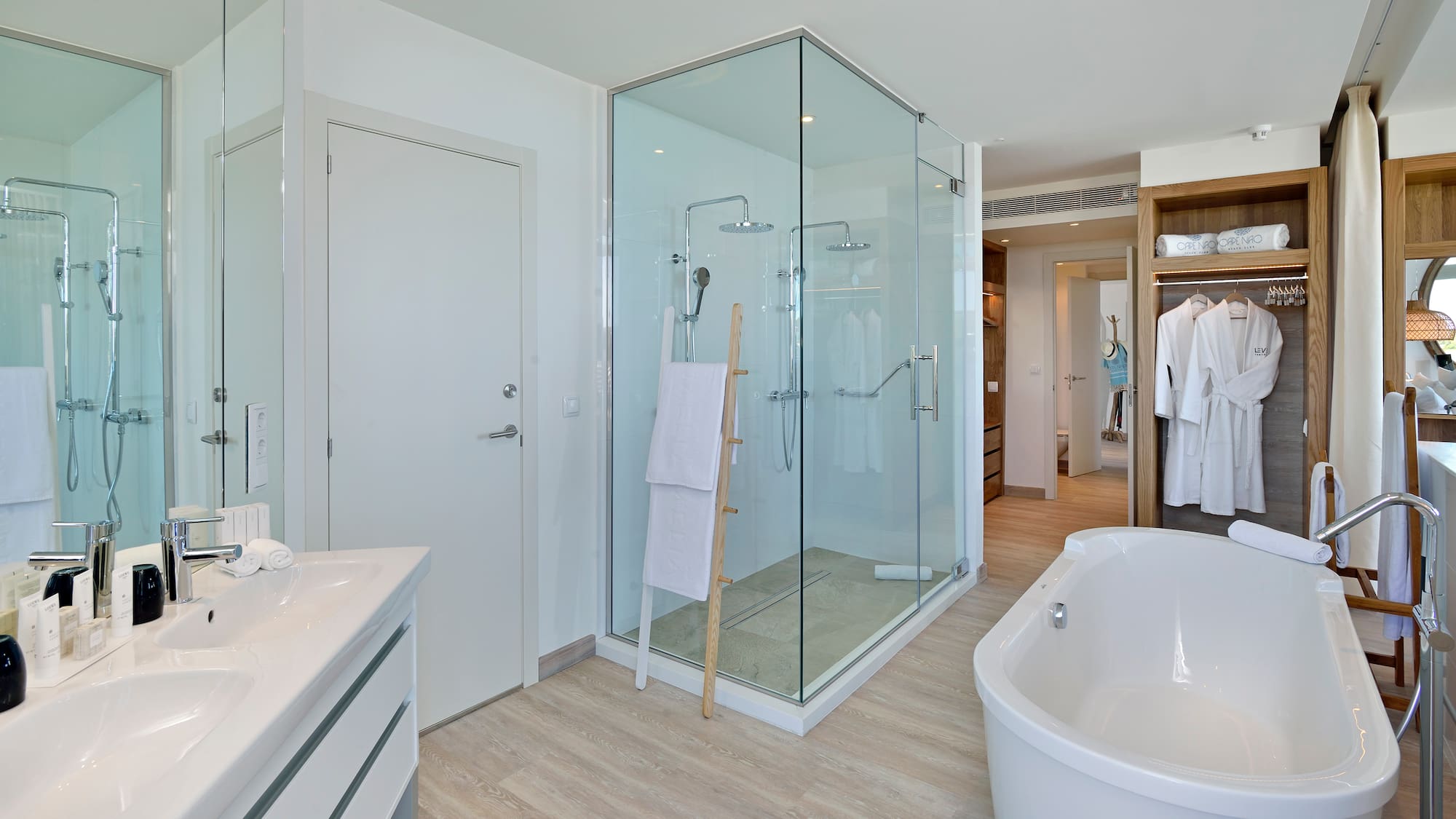 a bathroom with a tub and shower