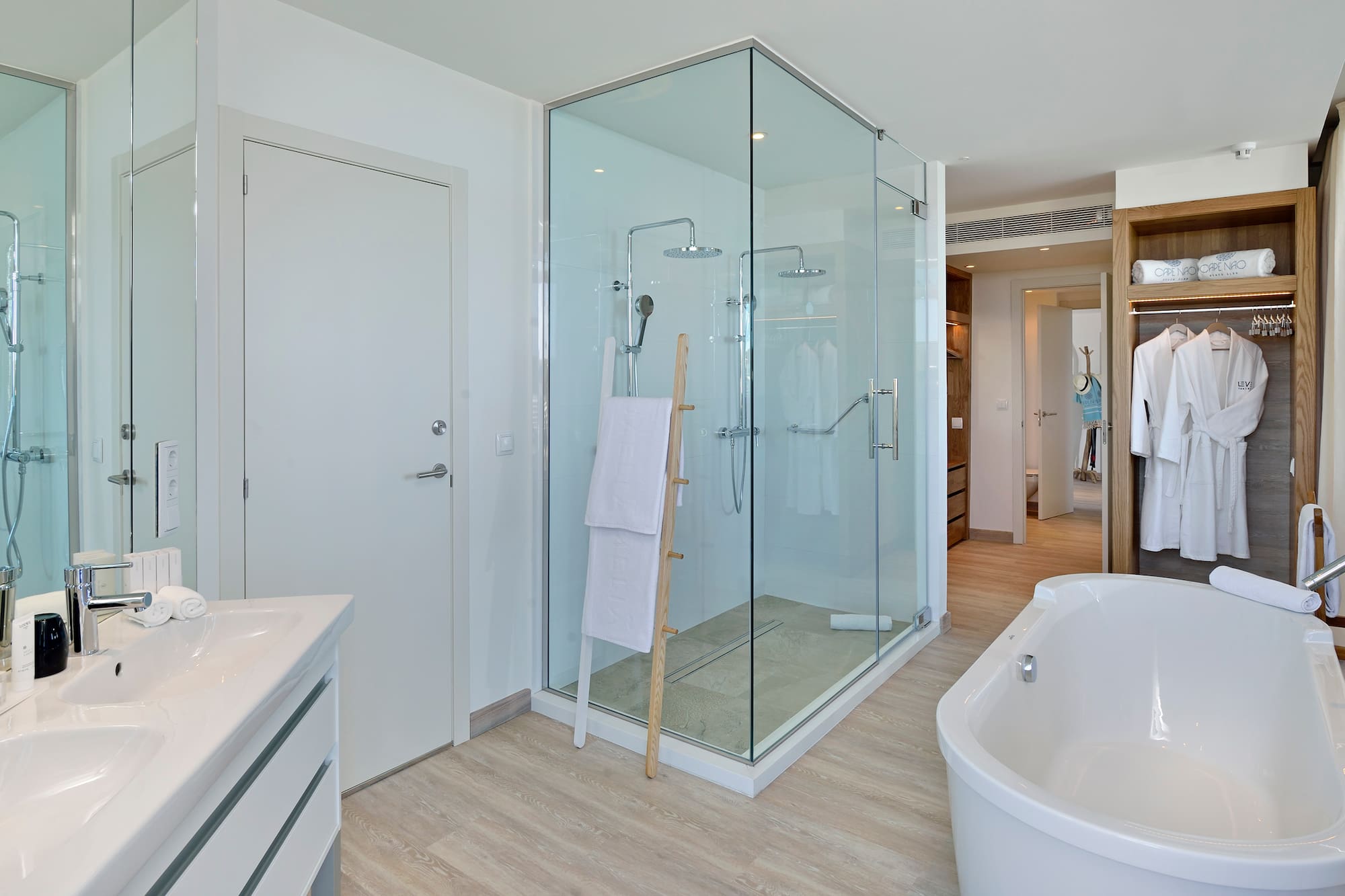 a bathroom with a tub and shower