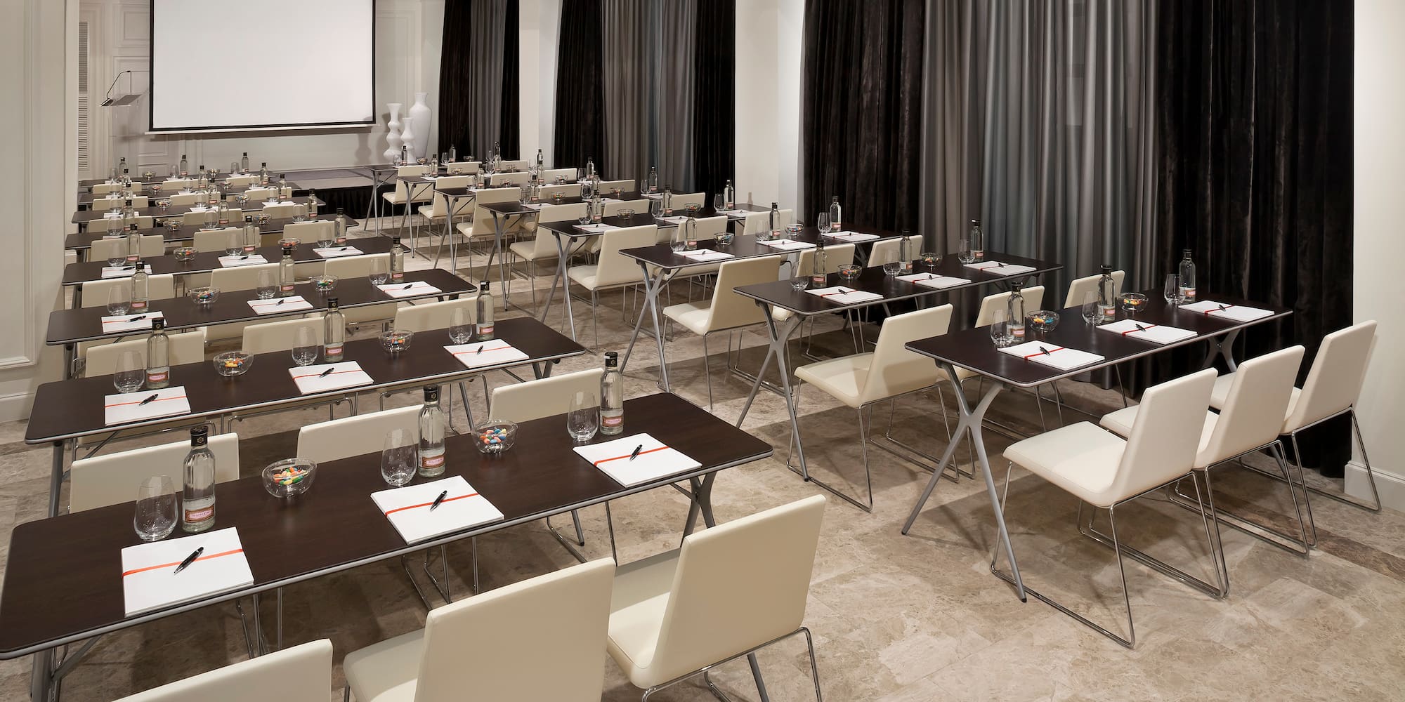 a room with tables and chairs