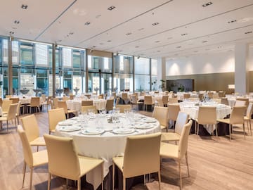 a large room with tables and chairs