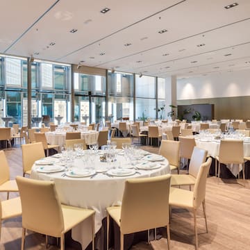 a large room with tables and chairs