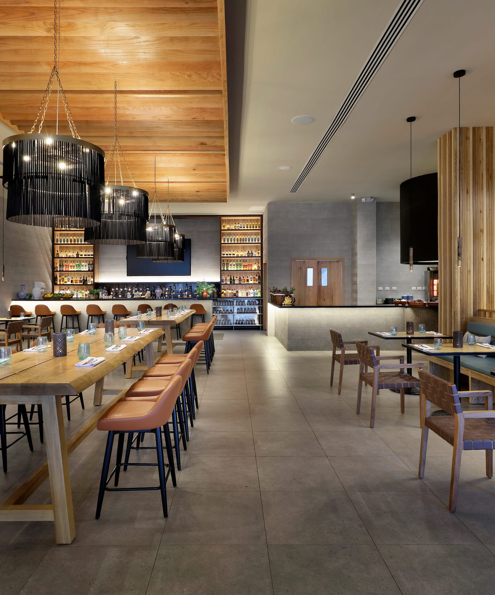 a restaurant with tables and chairs