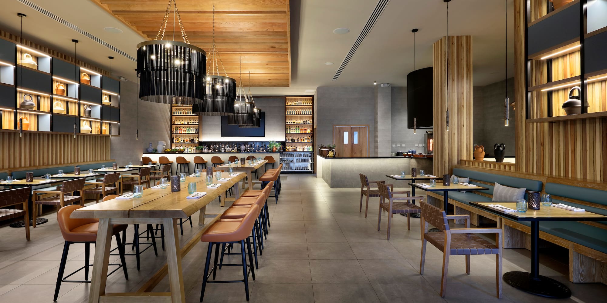 a restaurant with tables and chairs