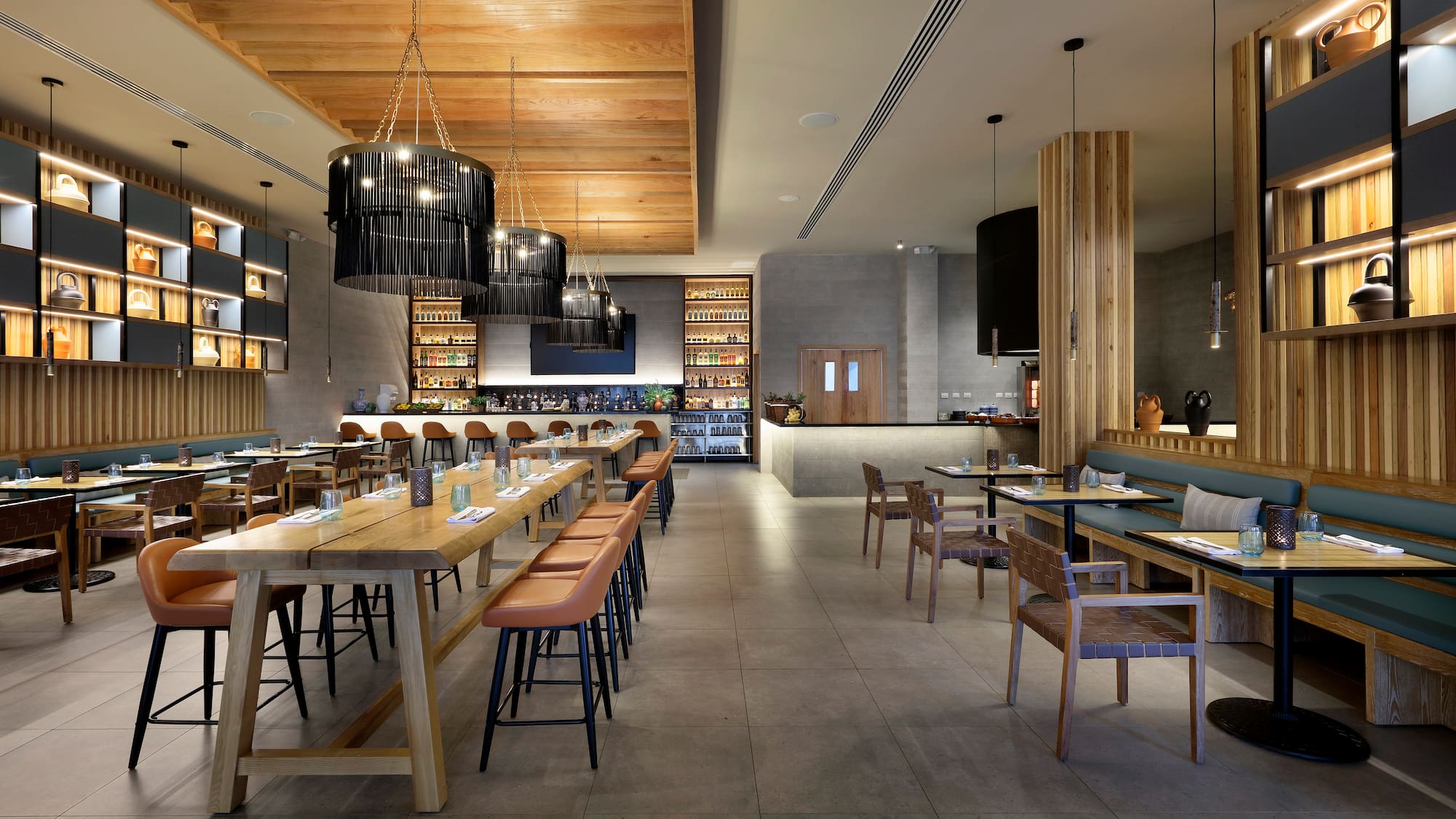 a restaurant with tables and chairs