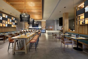 a restaurant with tables and chairs