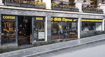 a building with a window and a sign