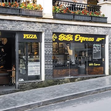 a building with a window and a sign