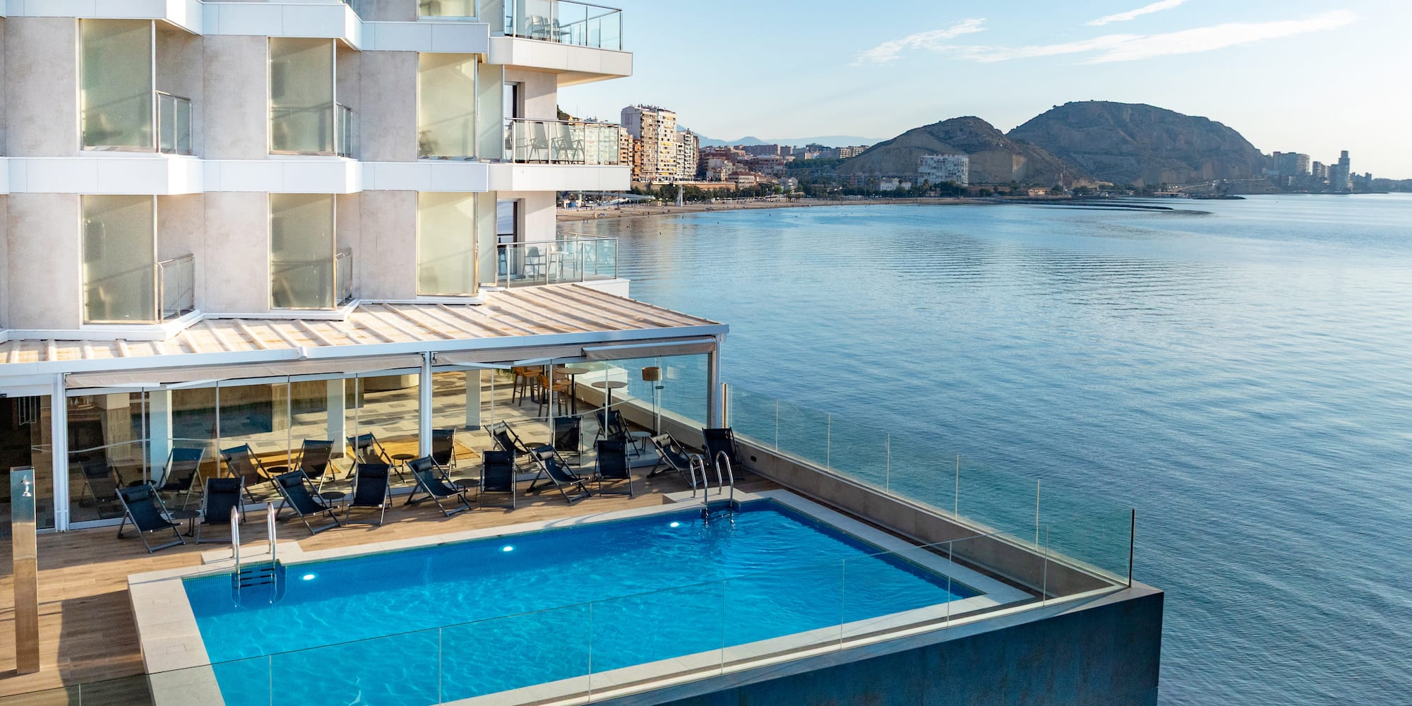 a pool next to a building