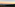 Sunrise over green valleys, distant Rock of Gibraltar, city, and wind turbines.