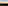 Sunrise over green valleys, distant Rock of Gibraltar, city, and wind turbines.
