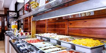 a buffet with food on the counter