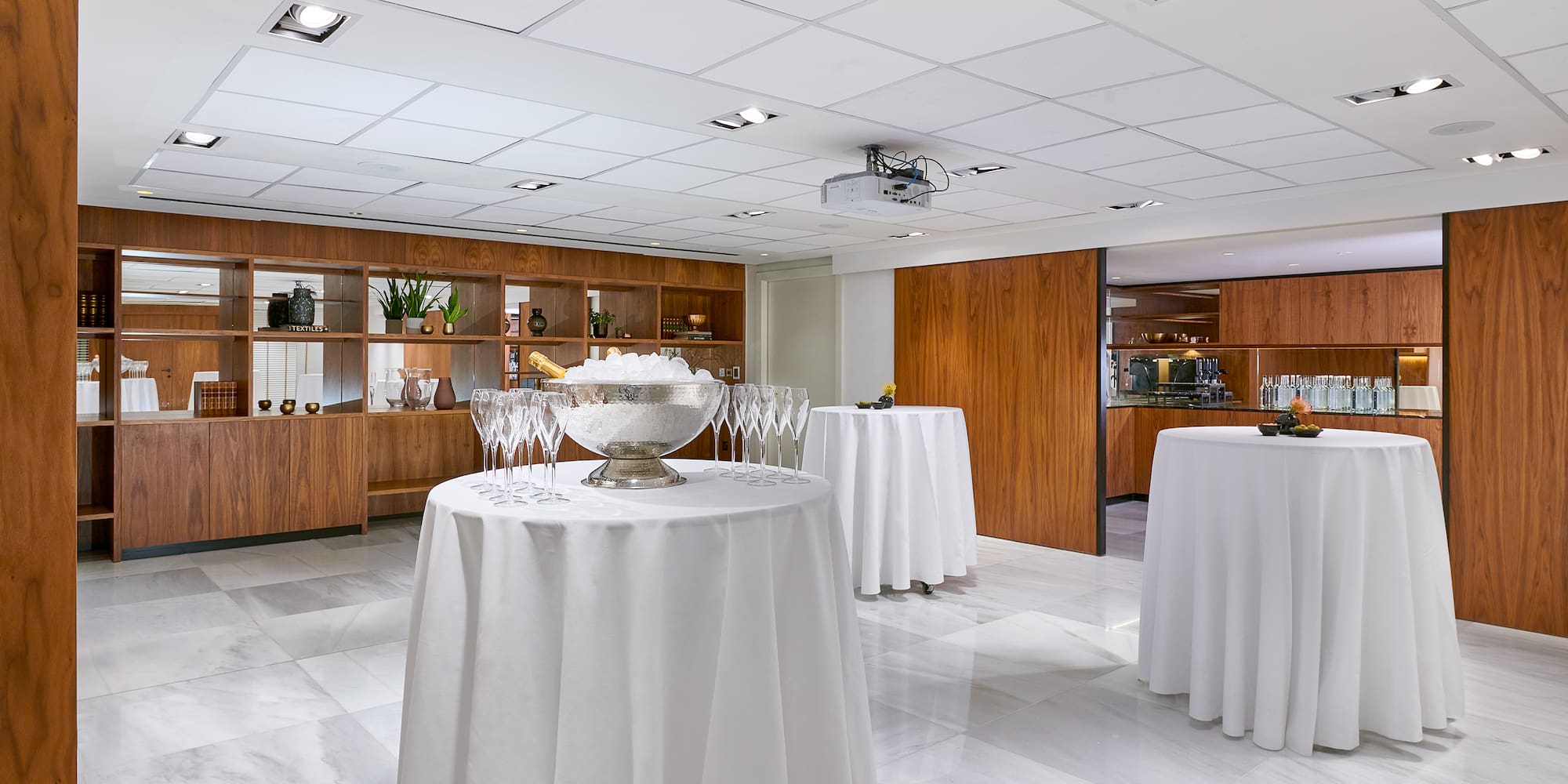 a room with tables and glasses