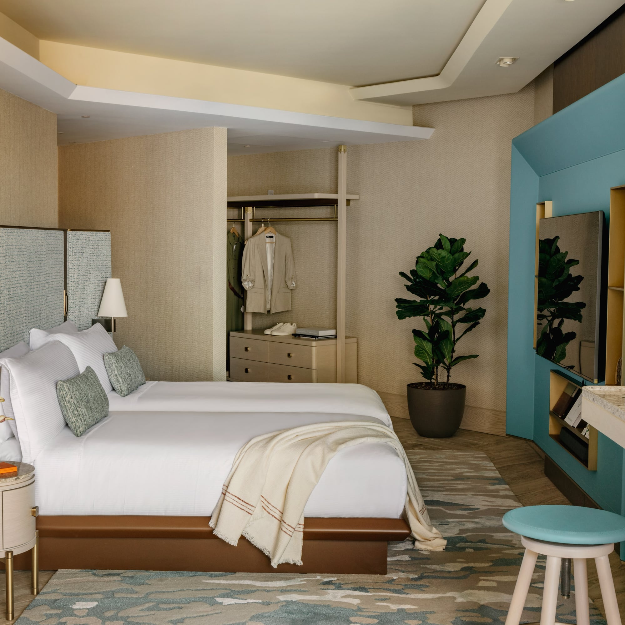 a room with a bed and a mirror