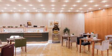 a room with tables and chairs