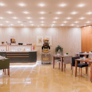 a room with tables and chairs