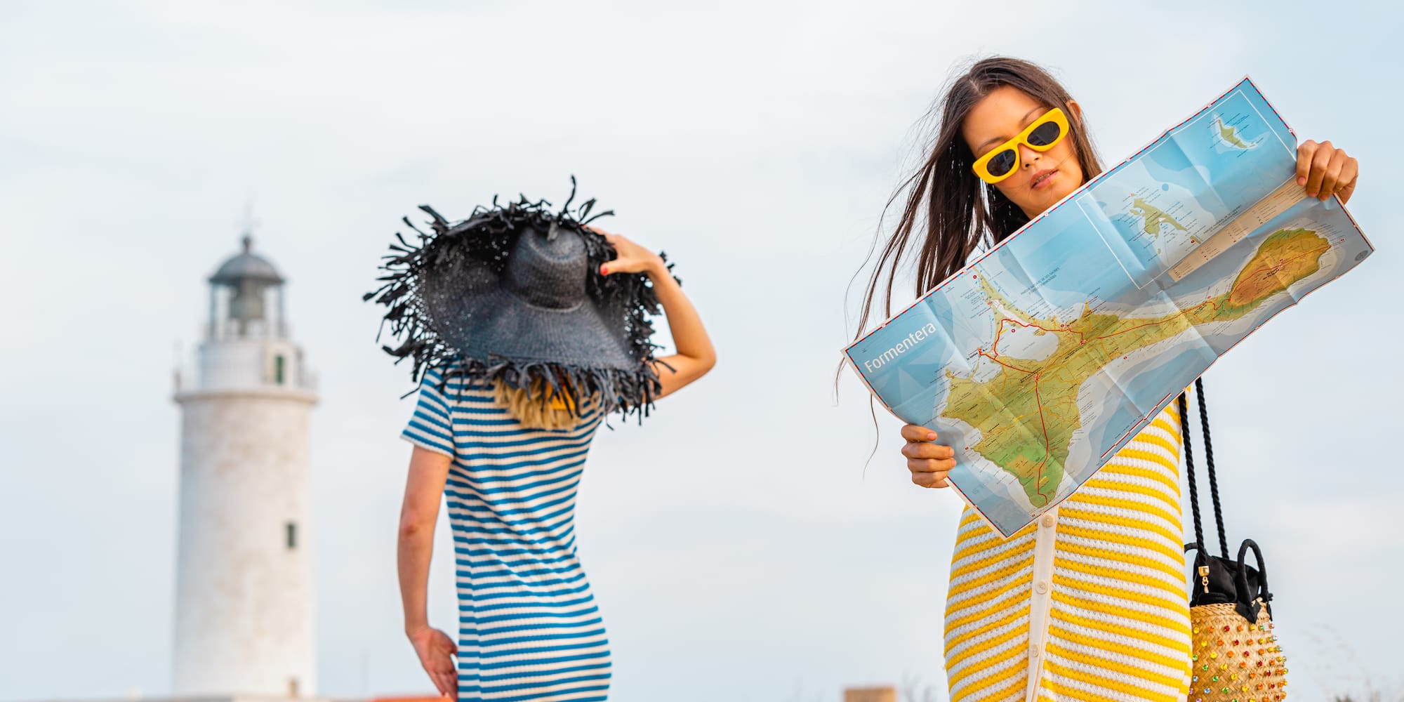 two women looking at a map