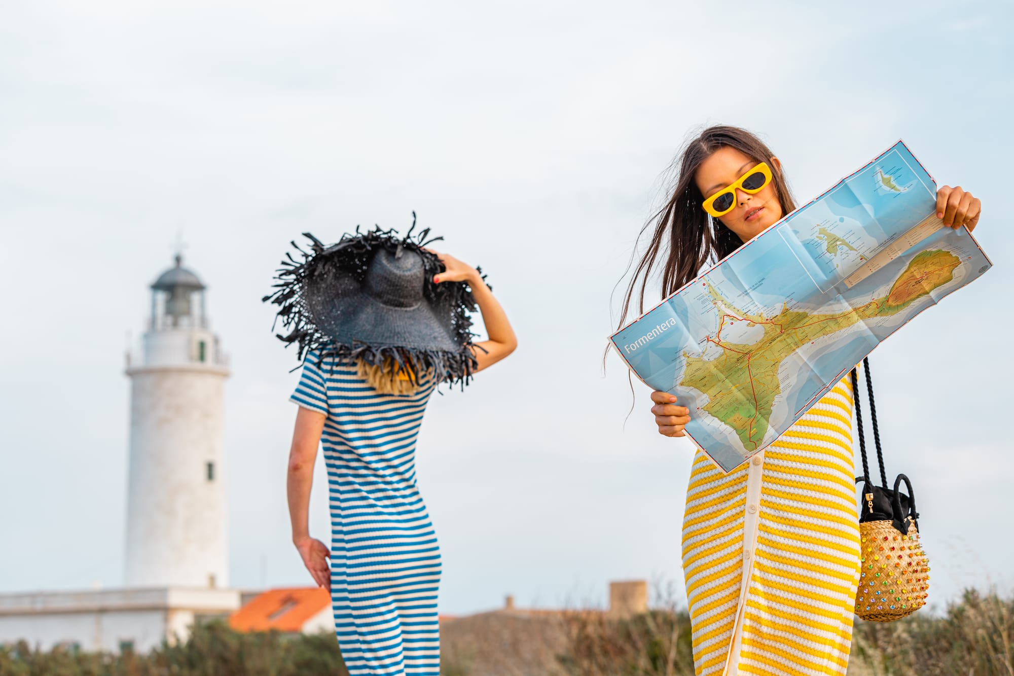 two women looking at a map