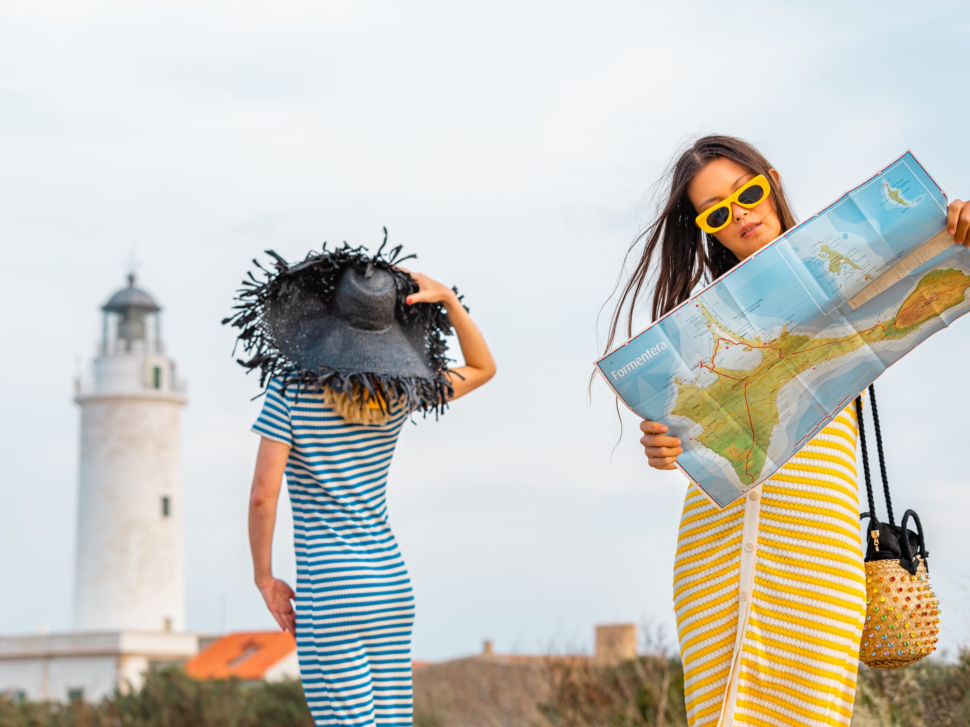 two women looking at a map