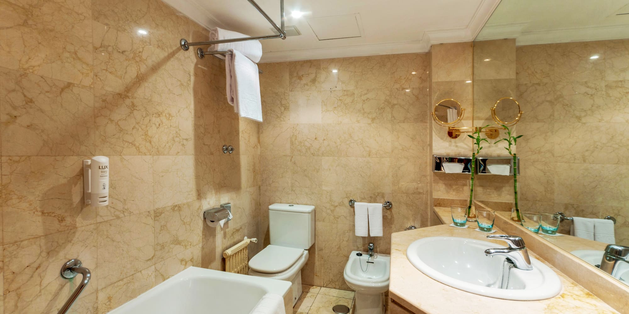 a bathroom with a sink toilet and toilet