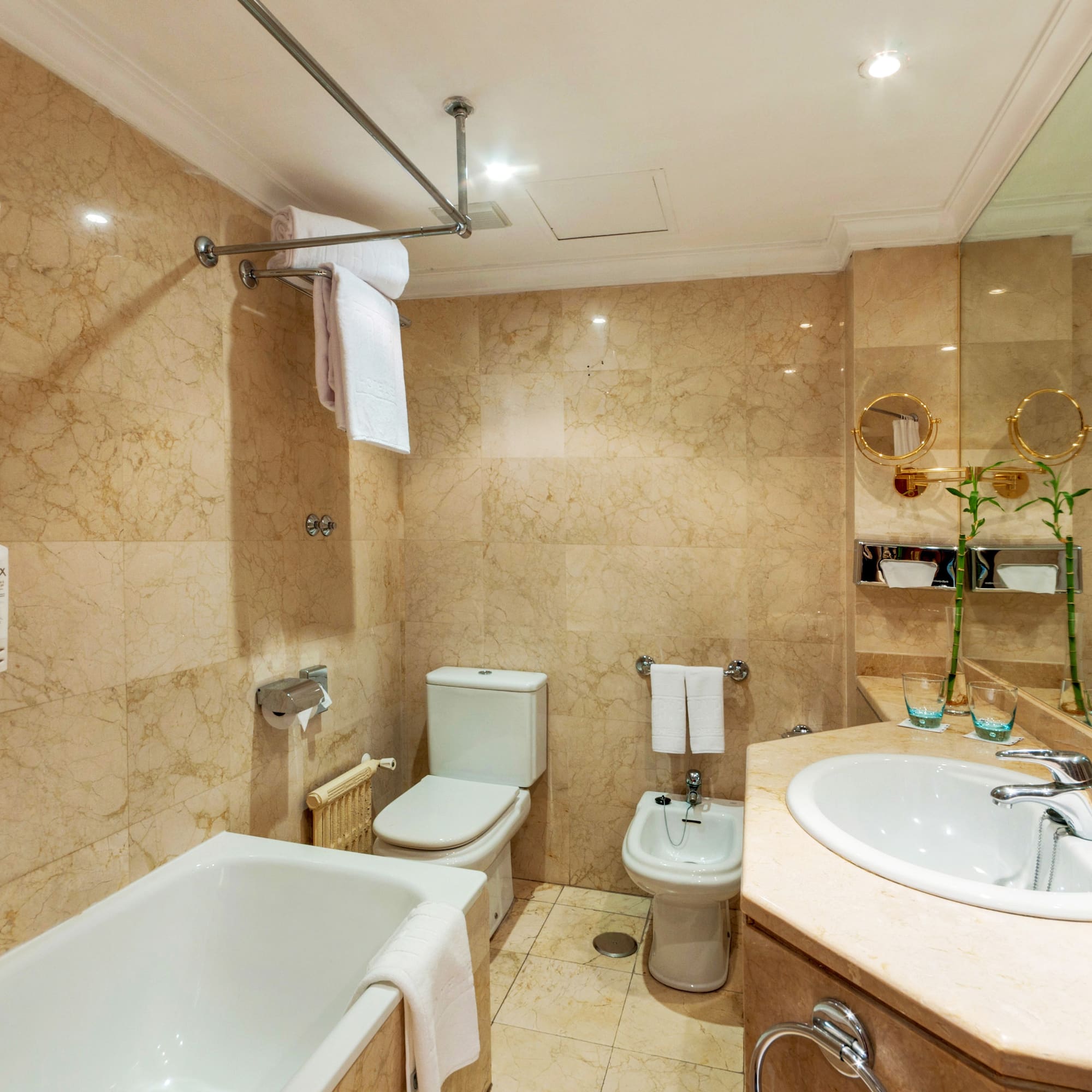 a bathroom with a sink toilet and toilet