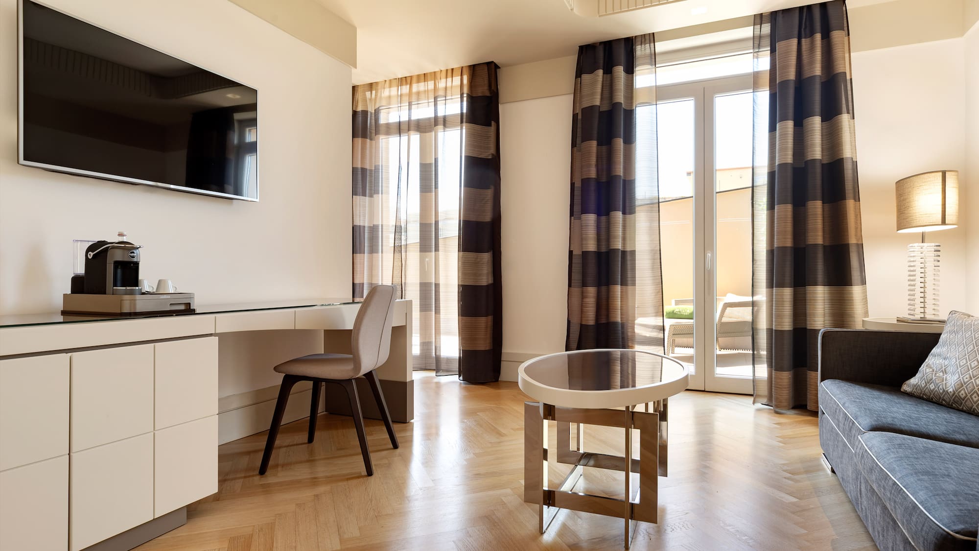 a room with a desk and a television