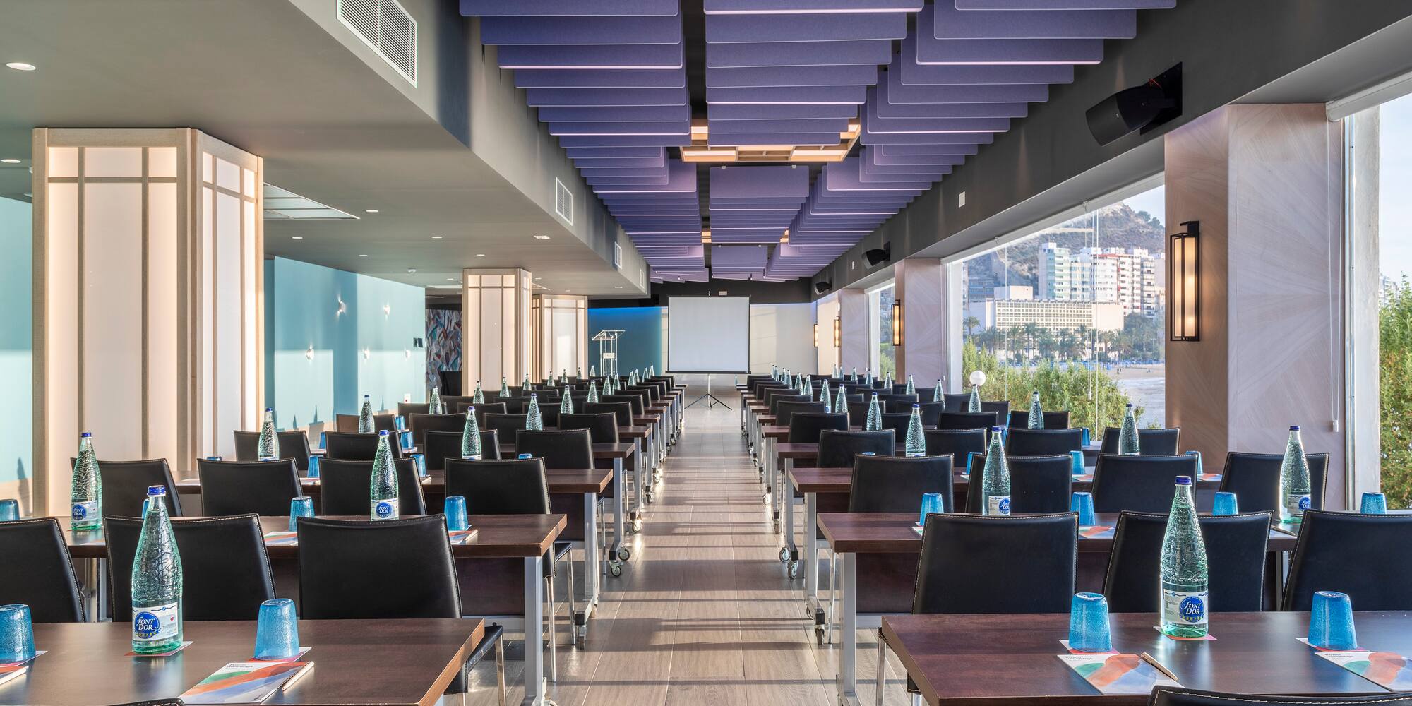 a room with tables and chairs