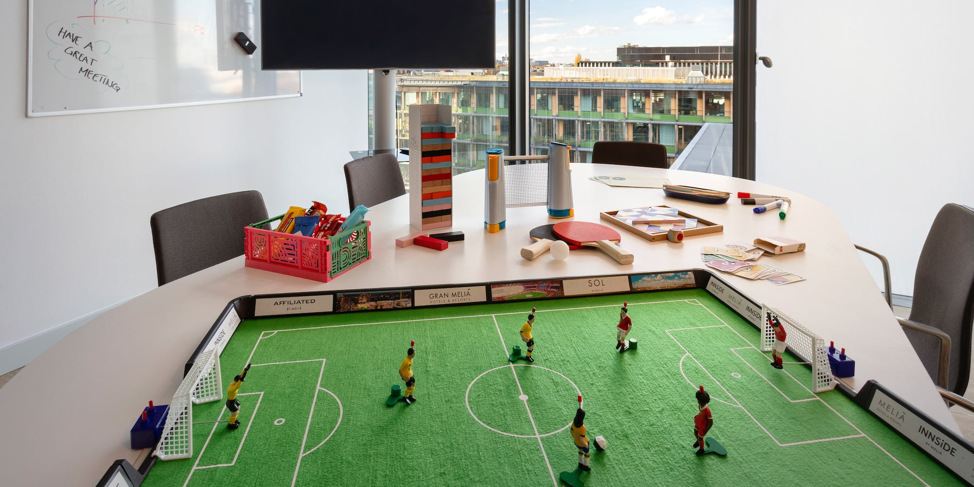 a table with toys and a football field