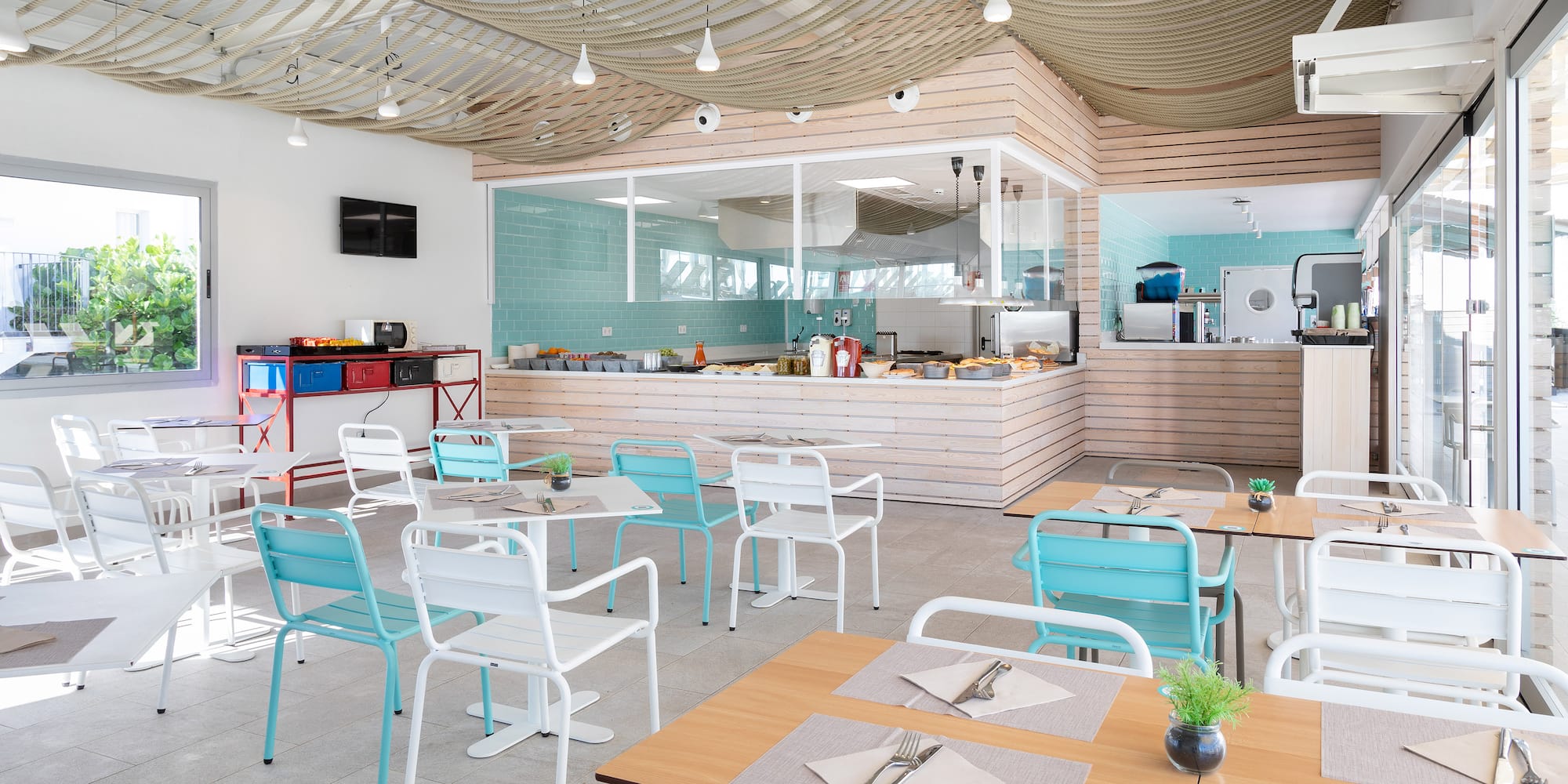 a room with tables and chairs