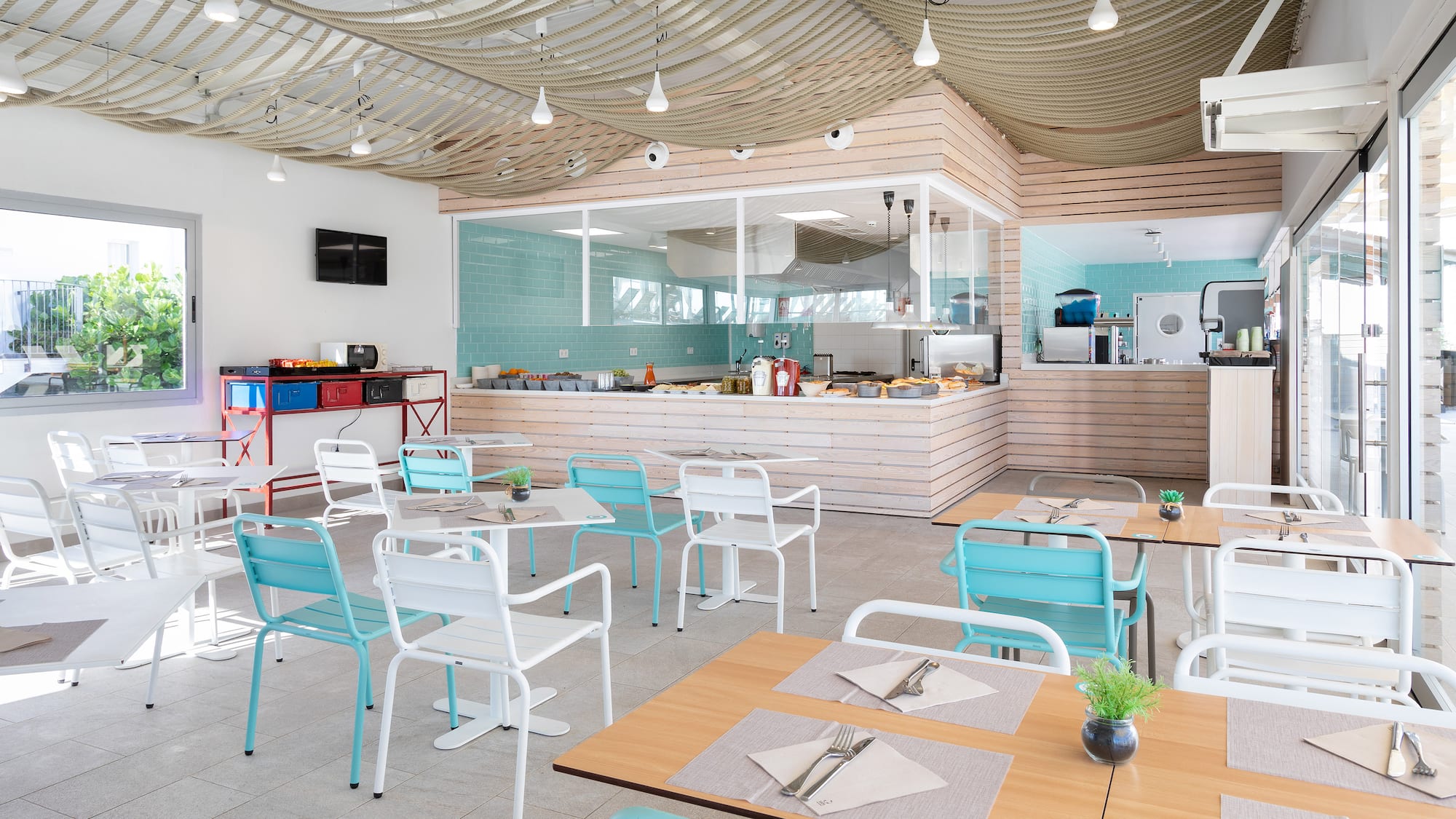 a room with tables and chairs