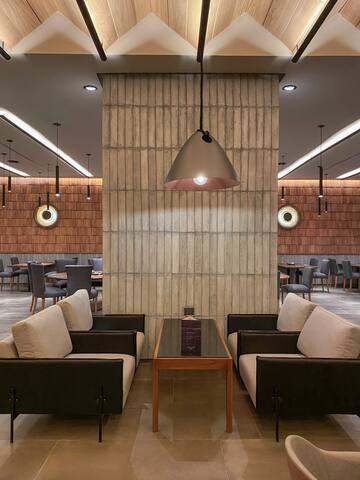 a room with chairs and a table