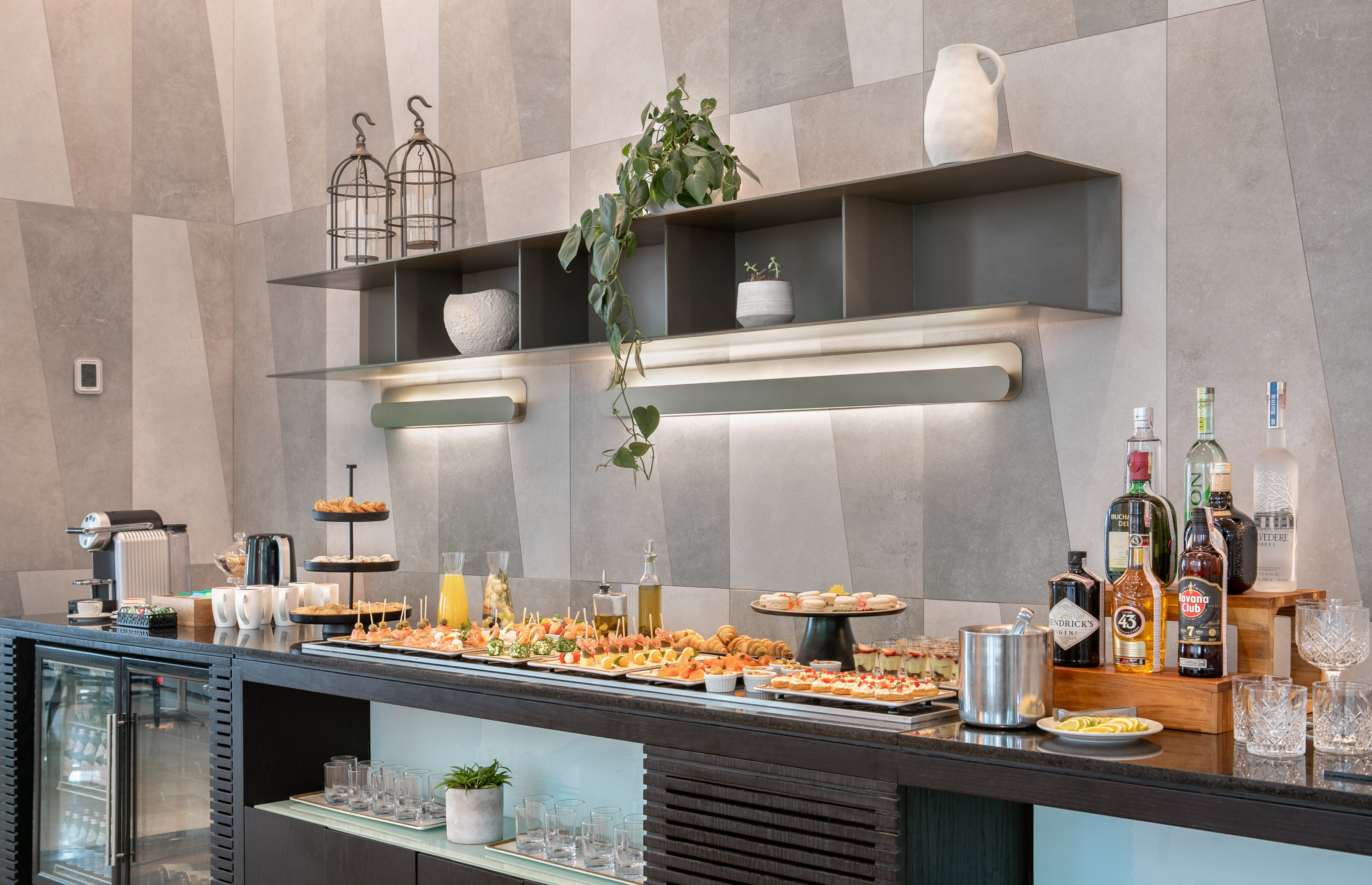 a group of white bowls on a shelf with food in them