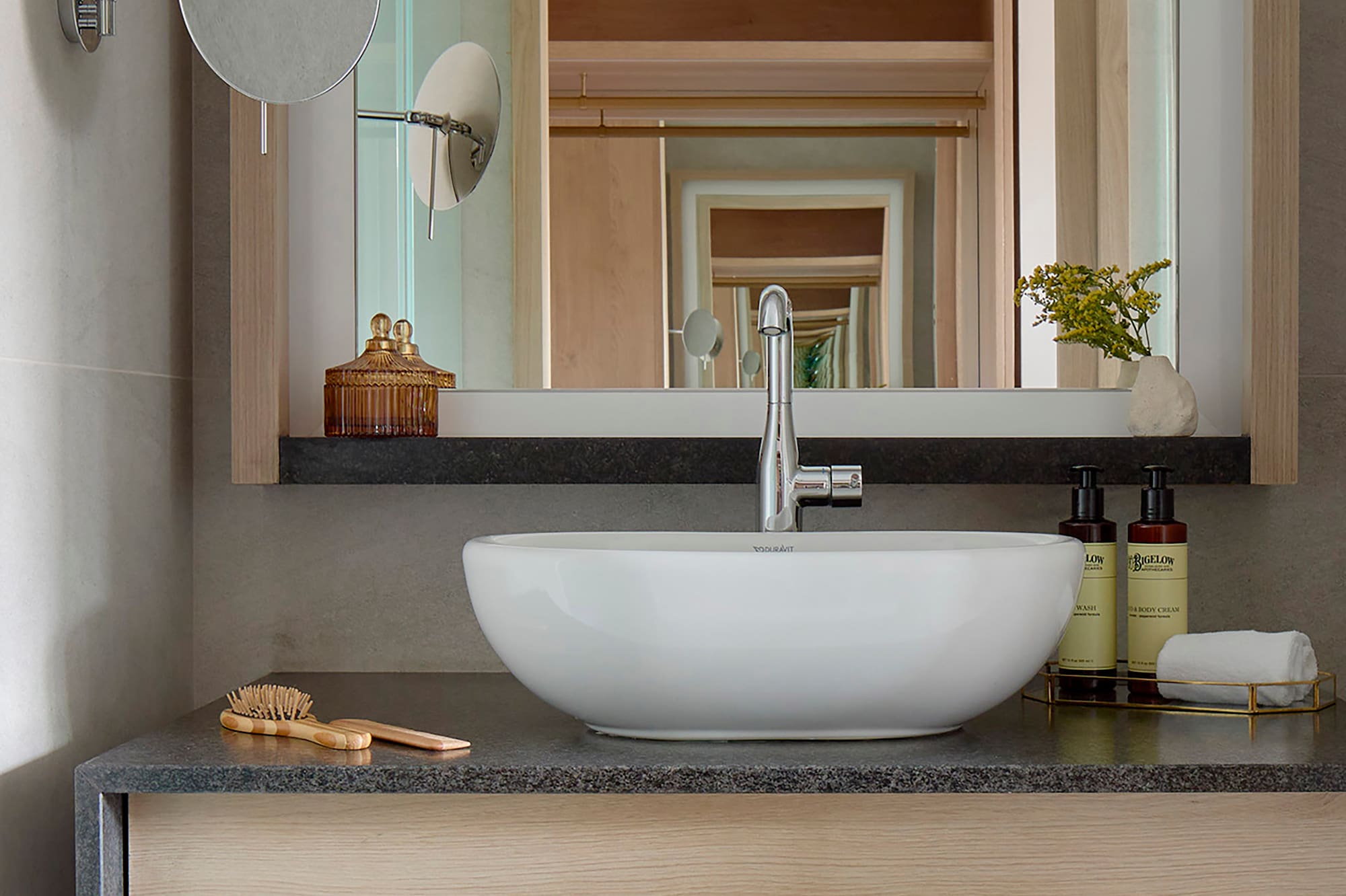 a bathroom sink with a mirror