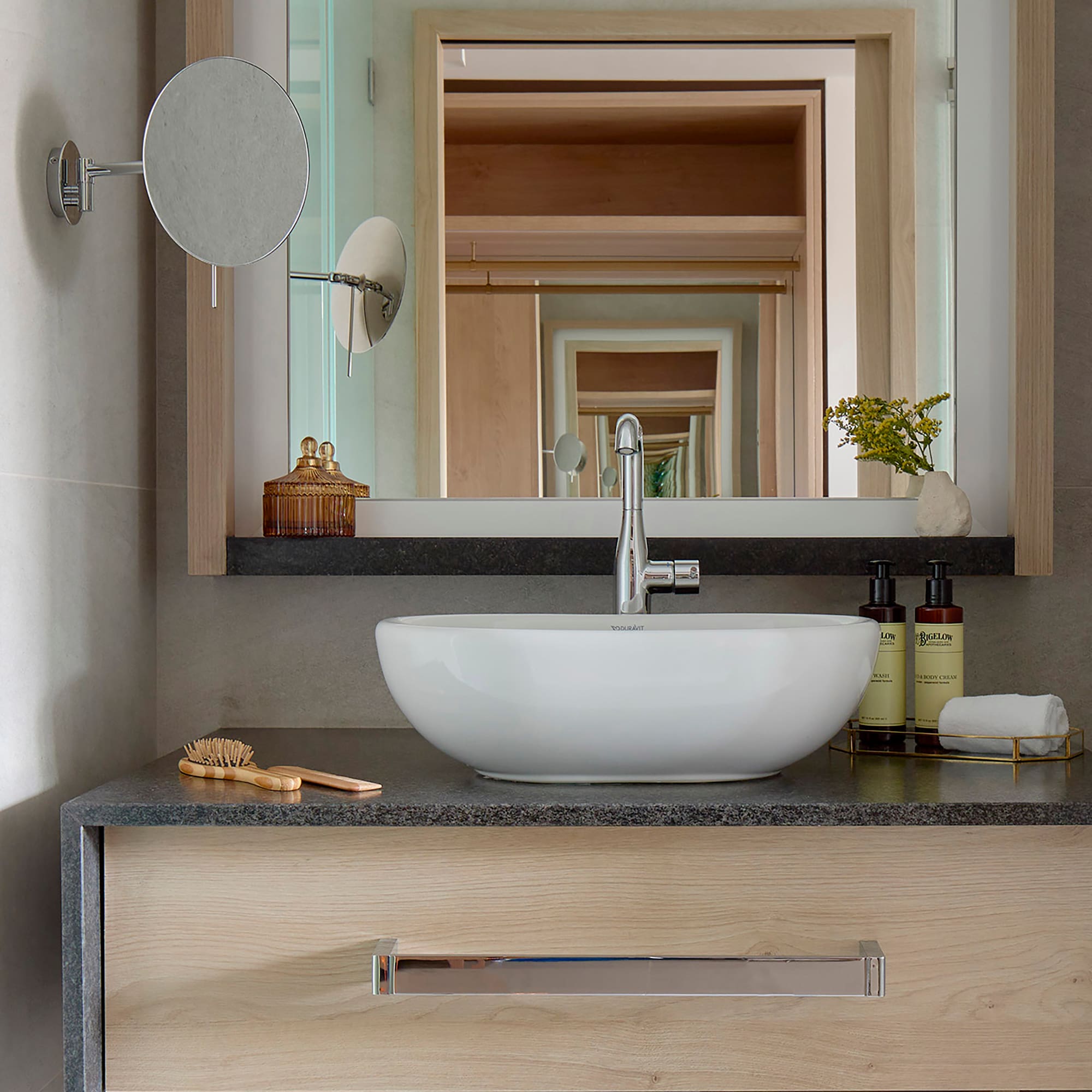 a bathroom sink with a mirror