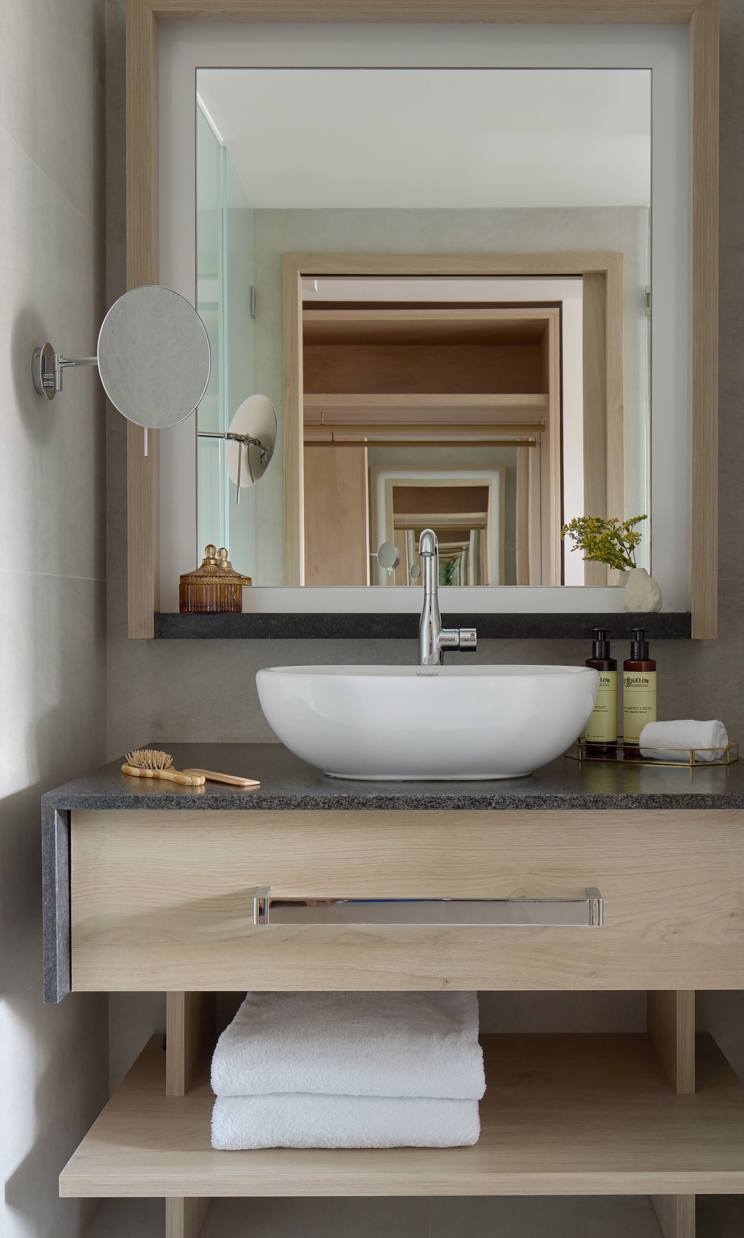 a bathroom sink with a mirror
