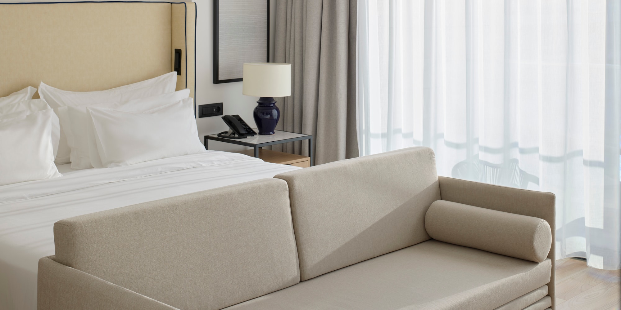 a couch in a hotel room