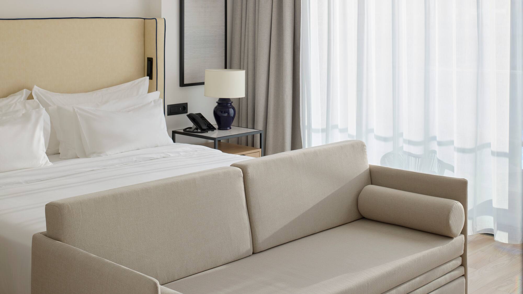 a couch in a hotel room