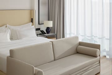 a couch in a hotel room