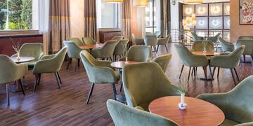 a room with tables and chairs