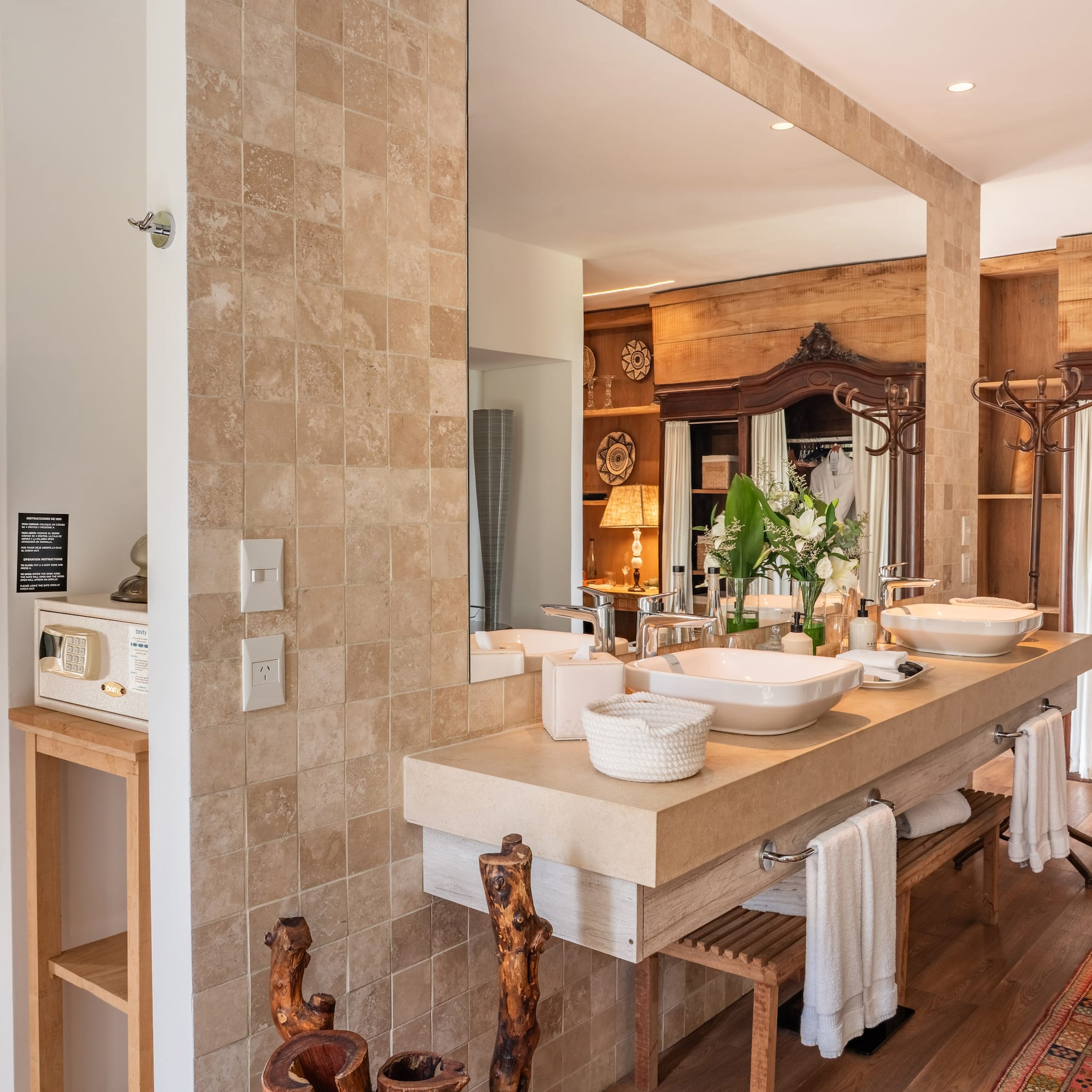 a bathroom with a large mirror and sinks