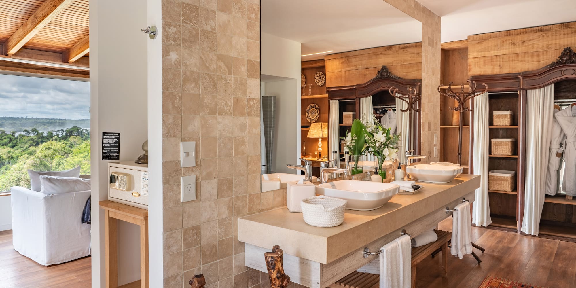 a bathroom with a large mirror and sinks