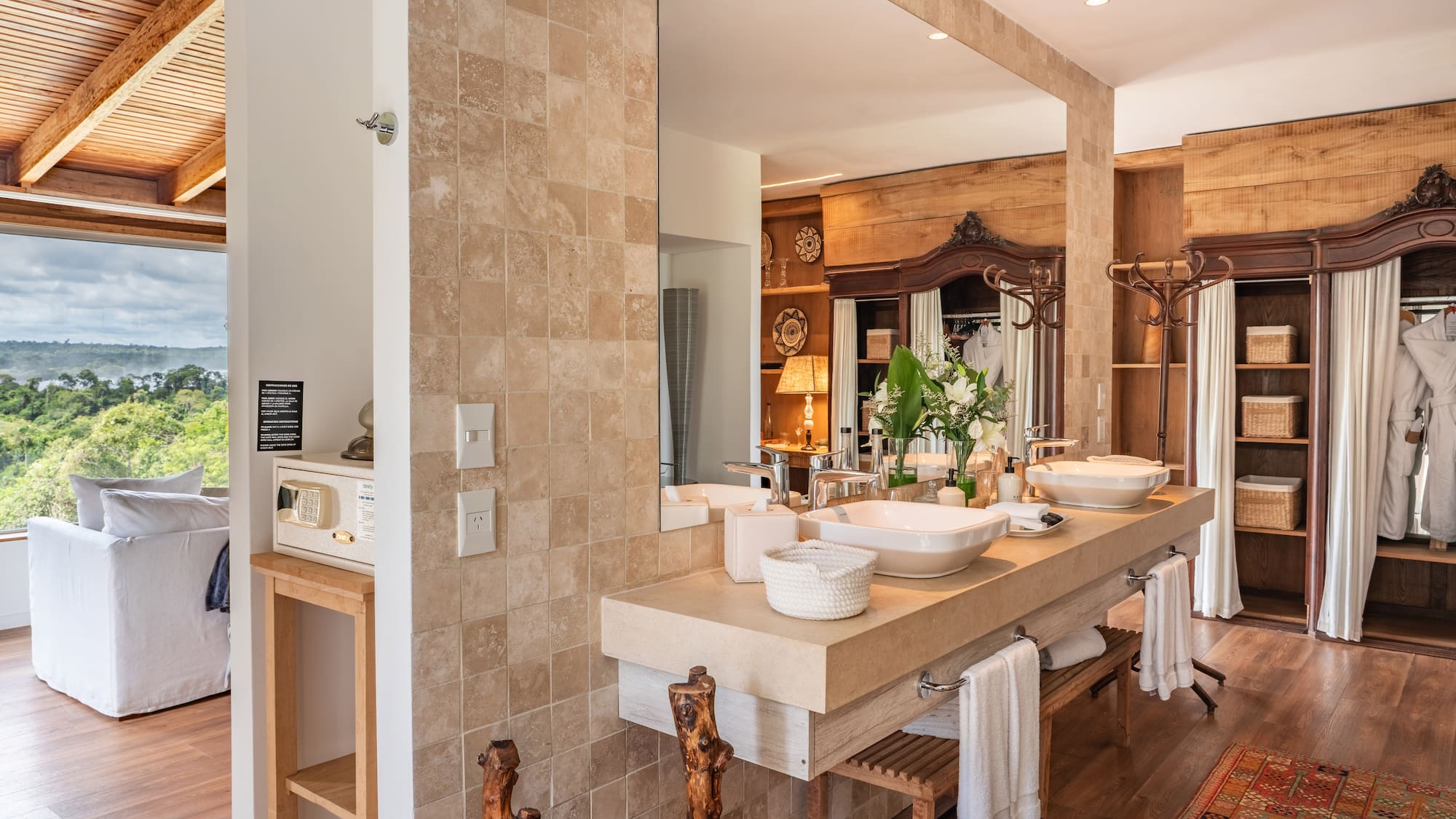 a bathroom with a large mirror and sinks